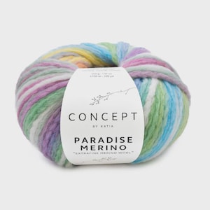 Peut inclure: Pelote de laine multicolore avec une étiquette indiquant "CONCEPT BY KATIA PARADISE MERINO". La laine est un mélange de couleurs pastel, dont le bleu, le vert, le rose et le jaune. L'étiquette indique également qu'il s'agit de "laine mérinos extra fine".