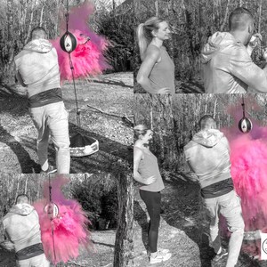 May include: A couple in a black and white photo, standing in front of a pink powder explosion. The man is holding a punching bag and the woman is looking at the explosion. The text "Tori & Jon" is visible in the bottom right corner of the image.