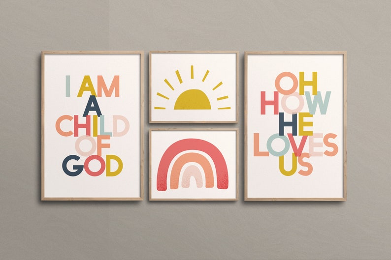 May include: Set of four framed prints with colorful text and illustrations. The prints feature the phrases "I am a child of God", "Oh how he loves us", and a rainbow and sun illustration.