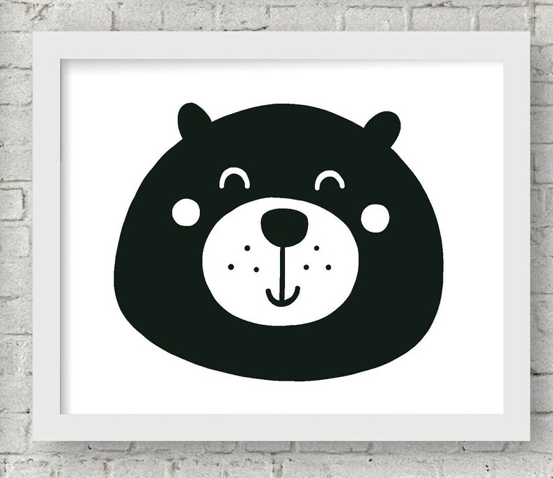 May include: Black and white illustration of a bear's face with a smiling expression. The bear has a round head, small eyes, and a large, round nose.