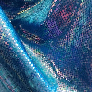 New iridescent blue 4 tone cracked ice design on poly spandex fabric 60" inch wide sold by the yard