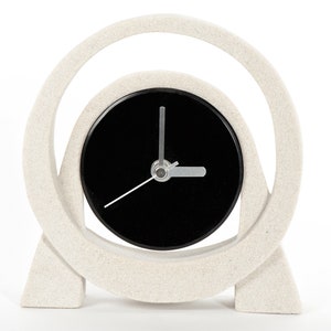 Fascinating little table clock, made of sandstone and glass. Living room clock to put down. Very stylish. Nice gift idea. Handwork. unique