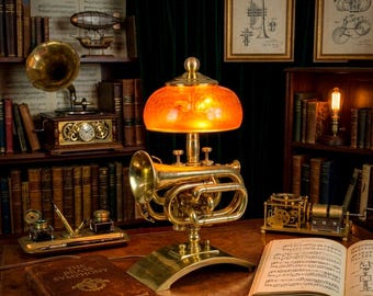 Pocket trumpet accent lamp on solid brass base.
