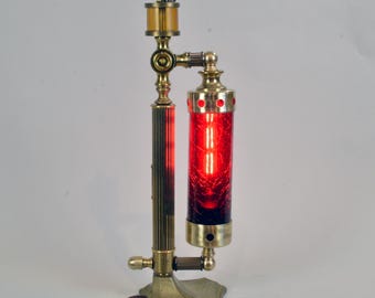 Steampunk accent lamp on vintage solid brass base.