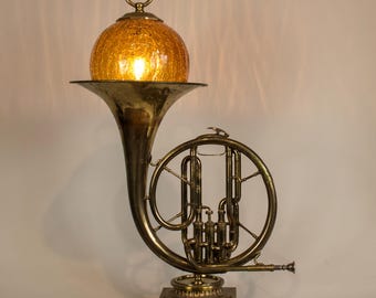 Elegant vintage French Horn accent  lamp with amber crackle glass orb.