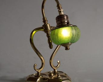 Accent lamp on converted vintage solid brass ink well.