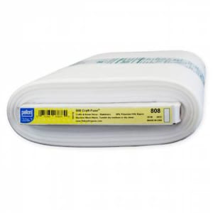 May include: A white roll of Pellon 808 Craft-Fuse interfacing for crafts and home decor. The label reads "808 Craft-Fuse", "Crafts & Home Decor - Stabilizer", "Machine Wash Warm, Tumble dry medium, dry clean", "60% Polyester 40% Rayon", "70 IN - 28412", "Made in USA".