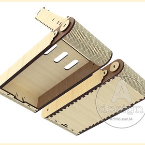 May include: A wooden box with a hinged lid and a decorative pattern. The box is open and the inside is visible. The box is made of light wood with a dark wood trim.