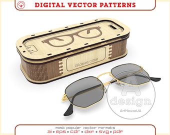 Puede incluir: Un estuche de gafas de madera con un recorte de gafas en la tapa. El estuche está abierto y un par de gafas de sol con montura dorada y lentes grises está sobre una superficie blanca. El texto "Glasses case" está impreso en el estuche.
