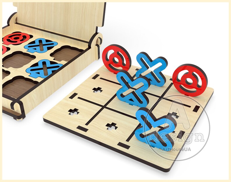 May include: A wooden tic-tac-toe game with blue X's and red O's. The game is open and the pieces are on the board. The board is made of wood and has a black border.