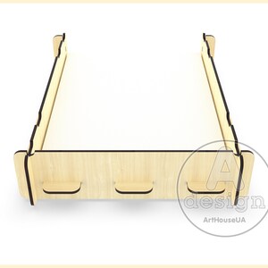 May include: A wooden bed frame with a light wood finish and black trim. The frame has three small drawers on the front.