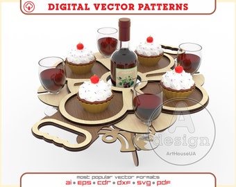 May include: Wooden serving tray with a cutout design, featuring four wine glasses, a bottle of wine, and four cupcakes with white frosting and red cherries on top. The tray has a handle and a decorative design.