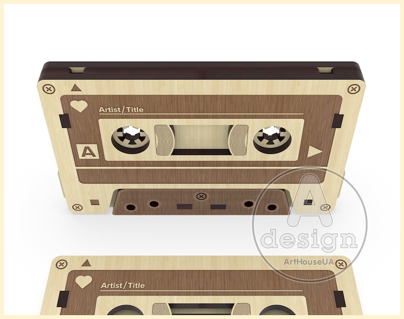 May include: A wooden cassette tape design with a brown top and a light wood body. The cassette has a heart symbol, the letter A, and the words "Artist/Title" on the front.