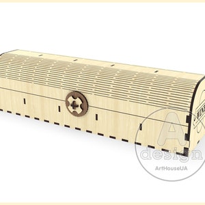 Puede incluir: Una caja de madera con tapa abatible y un cierre decorativo. La caja es de madera clara y tiene un ribete marr&oacute;n oscuro. La caja est&aacute; etiquetada como "Vino".