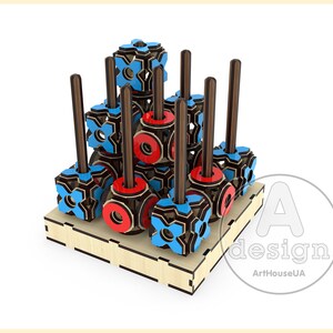 May include: A wooden toy with a stack of colourful geometric shapes. The shapes are red, blue, and black. The toy is on a wooden base.