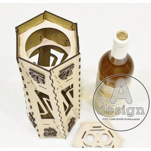 May include: A wooden wine bottle holder with a hexagonal shape and intricate laser cut designs. The holder is made of light brown wood and has a lid. The bottle holder is empty and ready to hold a bottle of wine.