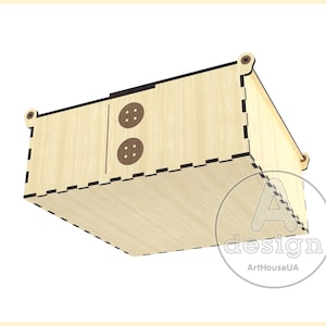 May include: A wooden box with a hinged lid and two button-shaped cutouts on the front. The box is made of light-colored wood and has a black and white checkered pattern around the edges.