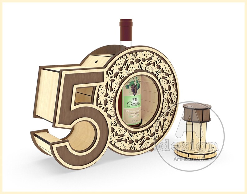 May include: Wooden wine bottle holder shaped like the number 50, with a decorative grapevine design. The holder has a slot for a bottle of wine and a separate compartment for a cork.