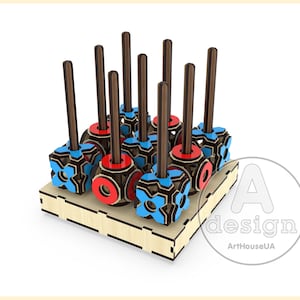 May include: A wooden stand with nine colourful wooden pieces on sticks. The pieces are red and blue with a geometric design. The stand is made of wood and has a natural finish.