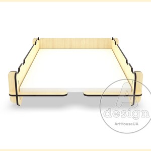 May include: A wooden tray with a black border. The tray is empty and has a light wood finish.