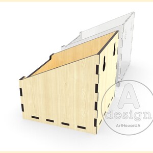 May include: A wooden organizer with a slanted design and black accents. The organizer has two holes on the side. The organizer is made of wood with a light wood grain. The organizer is sitting on a white surface. A design logo is visible in the bottom right corner of the image.