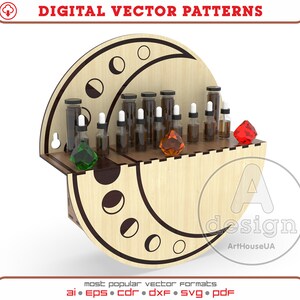 Op de afbeelding: Een houten plank in de vorm van een halve maan met een maanfasenontwerp. De plank heeft acht kleine glazen flesjes met druppelaars en twee kleine gekleurde glazen edelstenen. De plank is gelabeld met "A design ArtHouseUA".