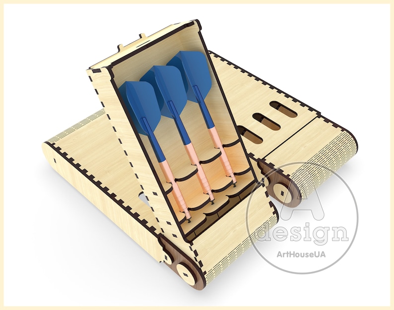 May include: A wooden box with a hinged lid, designed to hold darts. The box has a compartment for storing darts and a slot for holding the dart tips. The box is made of light wood and has a natural finish. The darts are blue and copper.