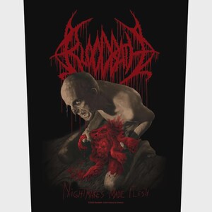 May include: A black poster featuring a macabre illustration. A pale figure with a grimace is shown with a red, fleshy mass. The word "BLOODBATH" is in red dripping letters at the top, with "NIGHTMARES MADE FLESH" at the bottom.