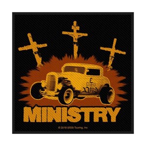 May include: A patch featuring a yellow hot rod car with three crosses in the background. The word "MINISTRY" is printed in orange block letters below the car. The background is black with a textured pattern.