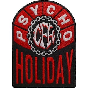 May include: Red and black embroidered patch with the text "Psycho Holiday" and a stylized "CFF" logo inside a chain link circle.