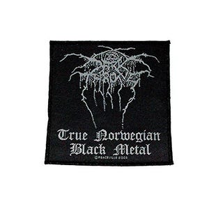 May include: Black square patch with white gothic text reading "True Norwegian Black Metal." The patch features a white, stylized graphic at the top. The text "PEACEVILLE 2003" is at the bottom.