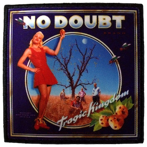 May include: A square patch with a dark blue background features the words "NO DOUBT" in gold lettering. The patch has a circular image of a woman in a red dress, a tree, and the words "Tragic Kingdom".