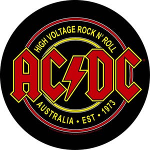 May include: A circular black sticker with the AC/DC logo in red and yellow. The text "HIGH VOLTAGE ROCK N' ROLL" curves across the top, with "AUSTRALIA EST 1973" at the bottom. A lightning bolt is in the center of the logo.