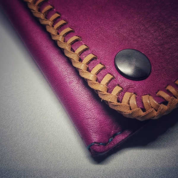 Fuchsia long wallet with tropical lining, laced with kangaroo.