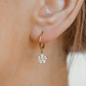 Gold Plated Sterling Silver Flower Huggie Earrings: Zirconia Charm