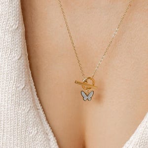 Collana a farfalla in oro / Collana con ciondolo a farfalla / Collana con barra a T / Collana a farfalla in oro rosa / Collana con barretta in argento