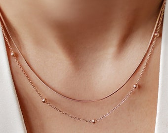 Collier superposé chaîne à pompons Or rose | Collier délicat en acier inoxydable avec chaîne serpent