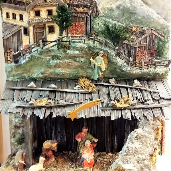 Crib picture Mittenwald made of wood and stone base plate 36 x 10 cm height 44 cm figures of cast resin painted 8 cm including lighting