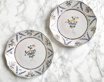 Pair of antique French flower pottery plates in the style of the 18th century