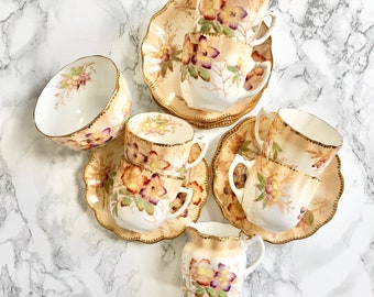 Antique porcelain tea service hand painted with polychrome flowers - Victorian work