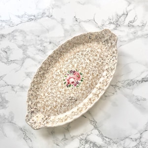 English factory of Royal Victoria Pottery Wade - 1 china chintz cake oval dish with pink flower designs on a background of golden scroll