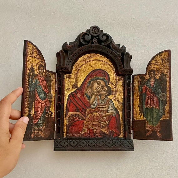 Virgin and Child, two angels on the two windows, Byzantine icon with woodcarved frame