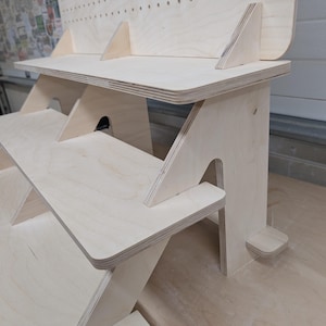 Collapsible three-tiered shelf with pegboard backer image 3