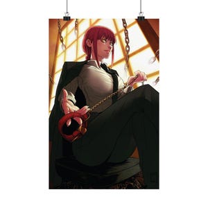 May include: A woman with red hair and yellow eyes sits in a chair, wearing a white shirt, black pants, and a black tie. She is holding a red chain with a gold ring attached to it.