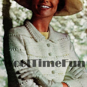 May include: A white crocheted cardigan with a button closure and a wide brimmed straw hat. The cardigan has a textured pattern and the hat has a yellow ribbon.
