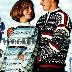 May include: A couple wearing matching blue, white and red patterned sweaters with a geometric design. The sweaters have a Scandinavian folk art style.