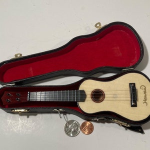 Wind up guitar instrument on sale