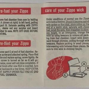 May include: A folded paper instruction sheet for Zippo lighters. The sheet is white with red text and illustrations. It provides instructions for refueling, re-flinting, and wick care, along with a section on the lighter's features.