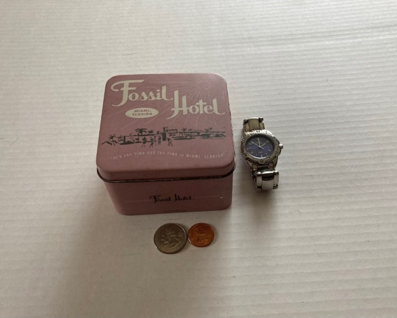 Vintage 2000 Fossil Hotel Tin Can With 