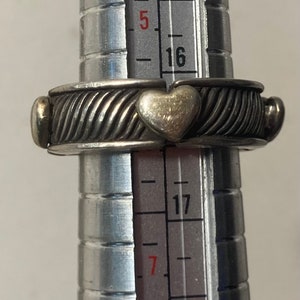 Vintage Sterling Silver Ring with Nice Hearts and It Stretches a Bit Design